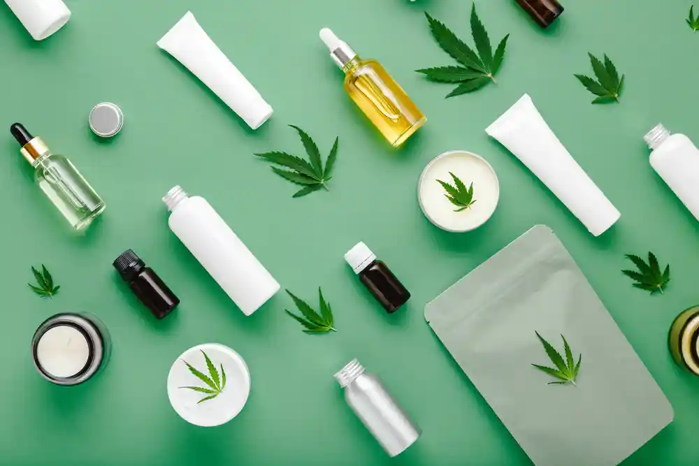 Cannabis products on a green background