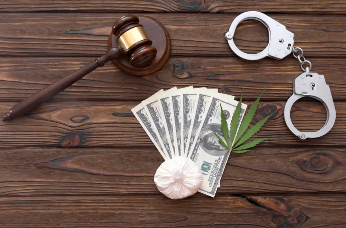Gavel with money and cuffs