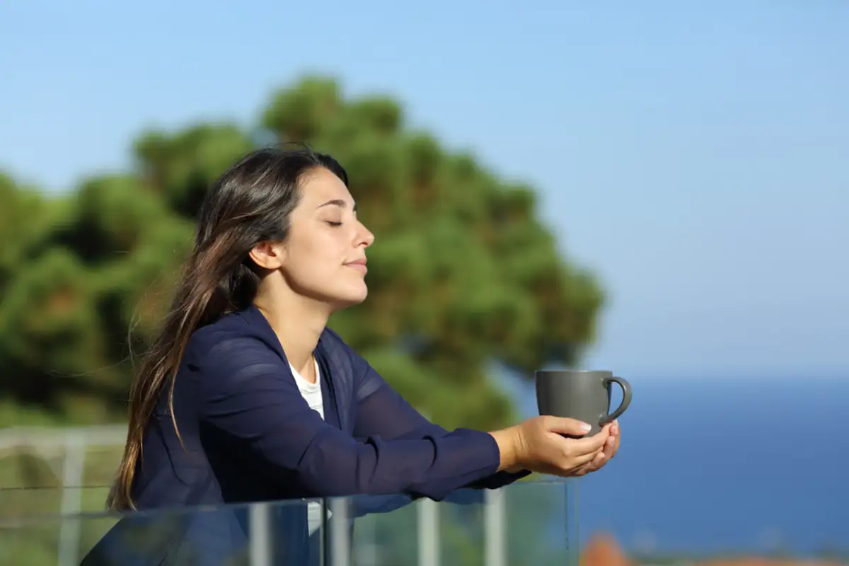 Woman feel relax on a balcony