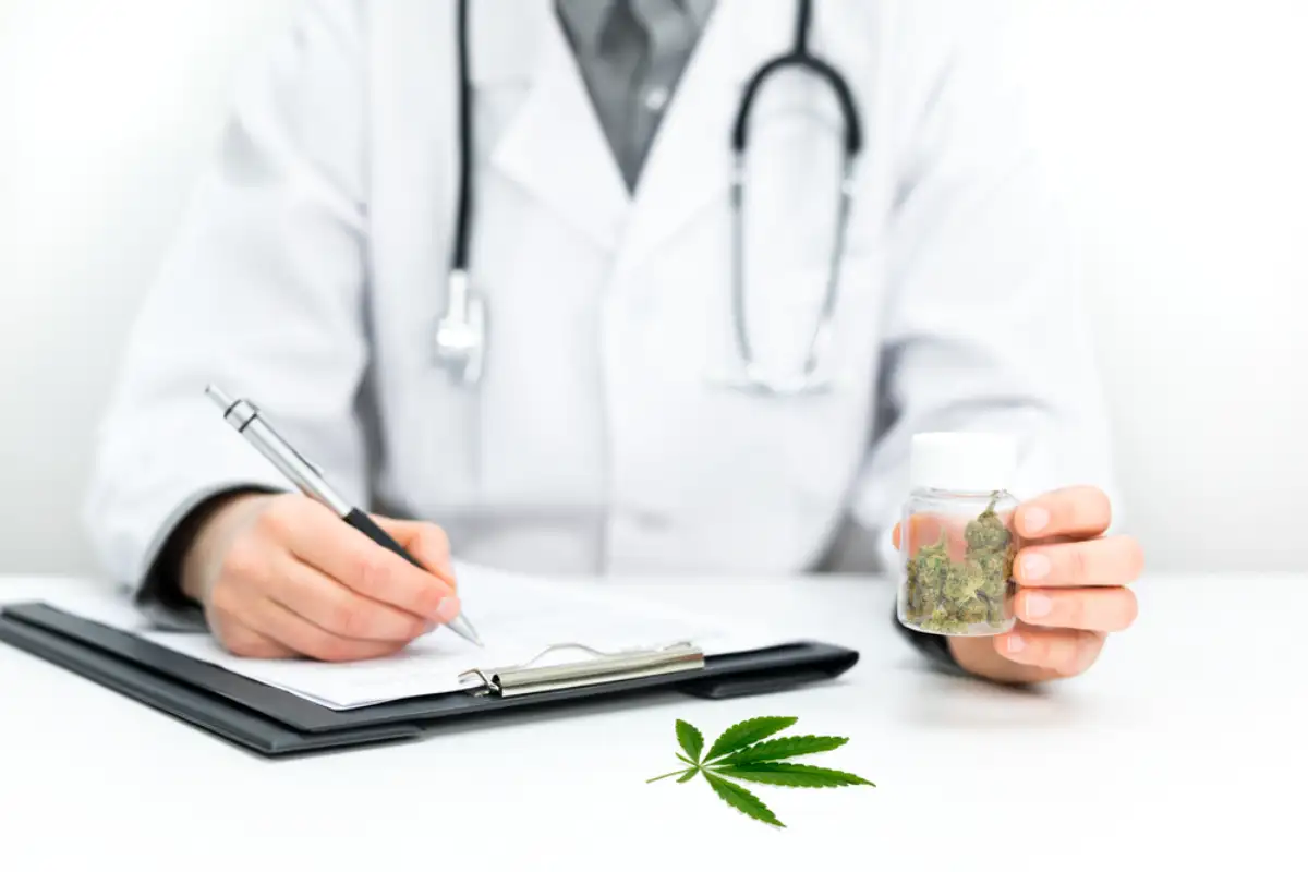Doctor gives out a prescription for medicinal cannabis as a cure for pain
