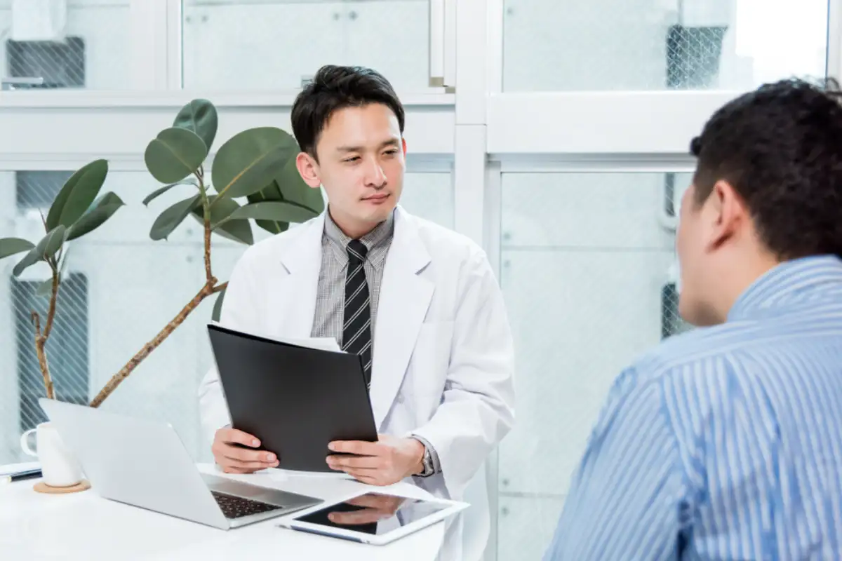 Doctor talking to his patient with ADHD