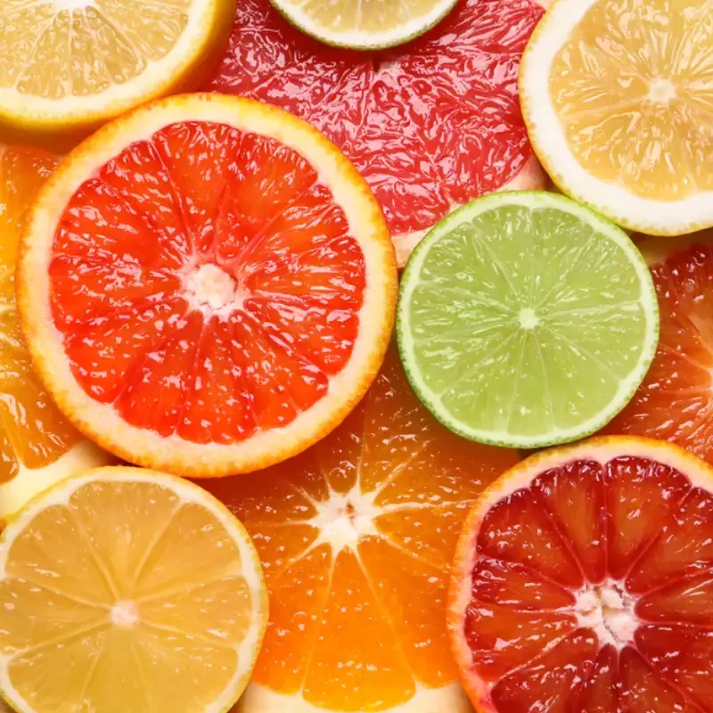 Fresh juicy citrus fruits as background