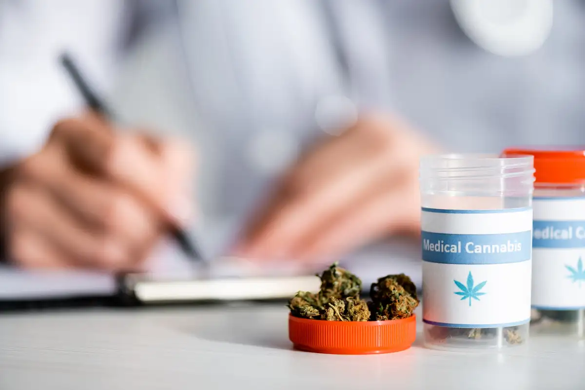 Medical Cannabis Products with doctor on the background