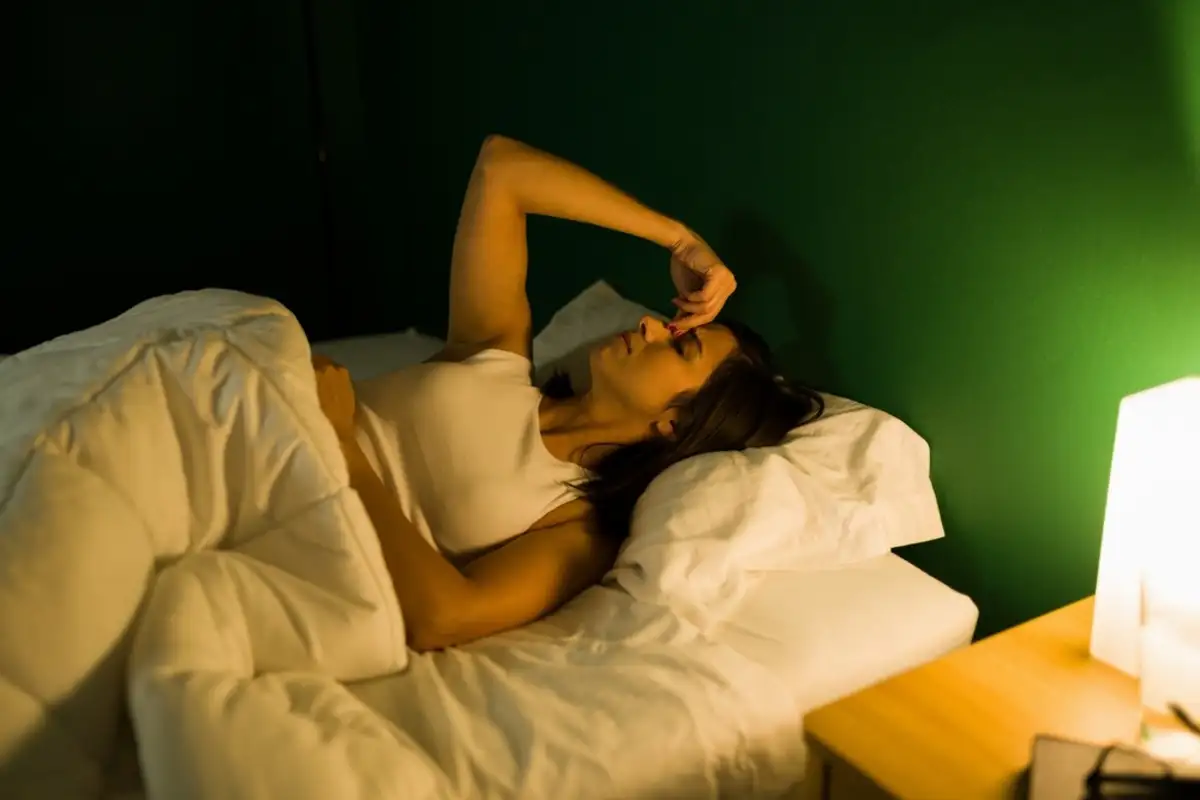 Woman having a hard time to sleep