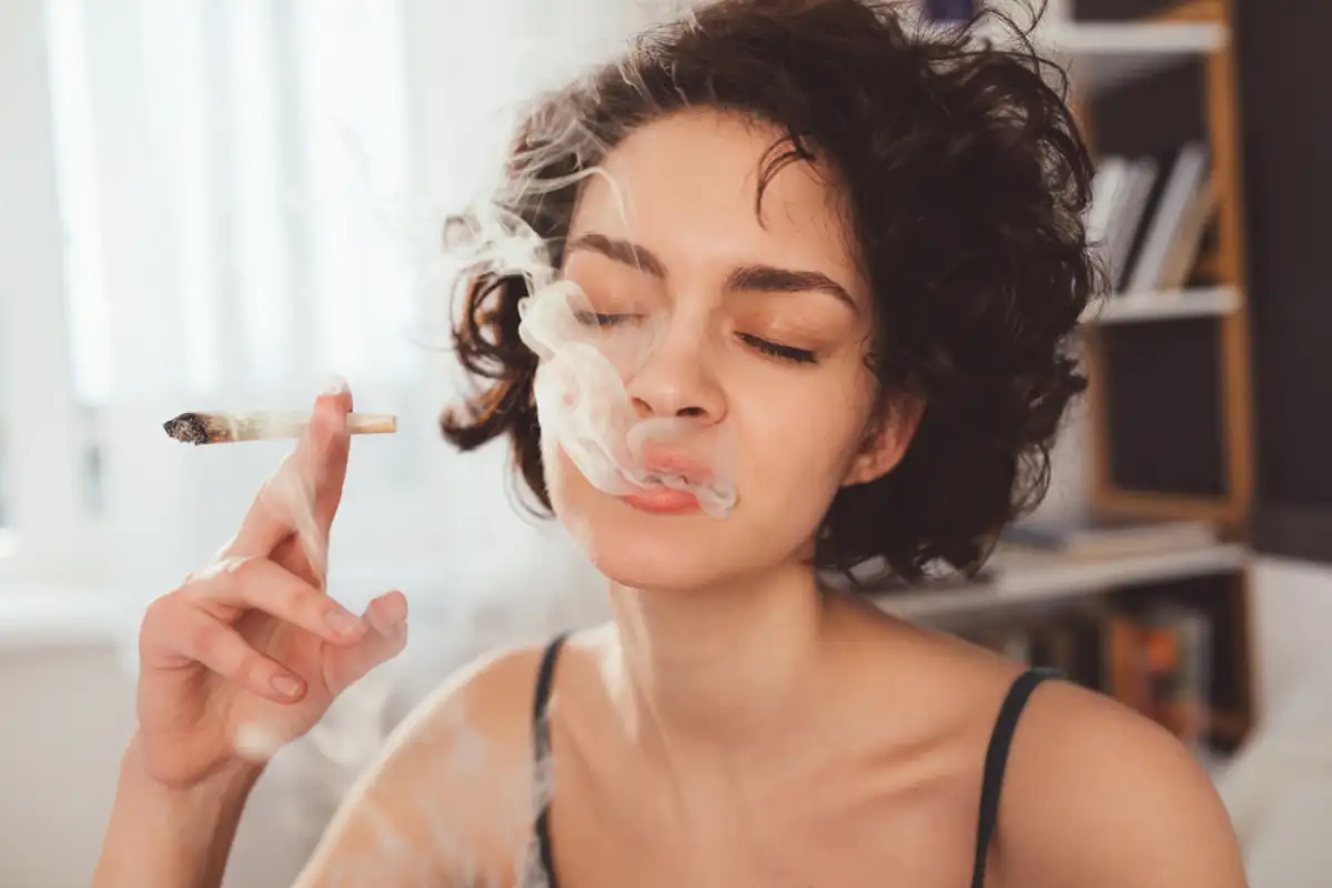 Close Up Of Woman Smoking Cannabis