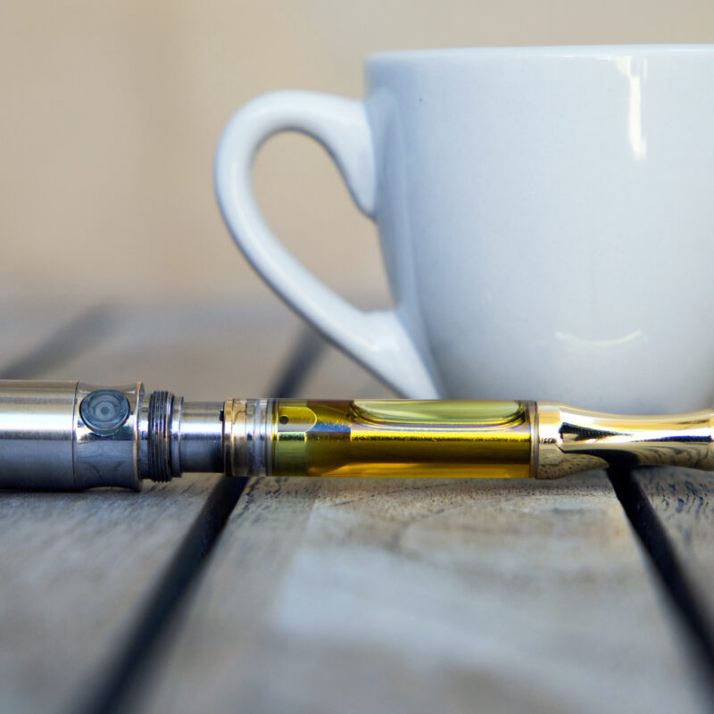 Vape Pen And Coffee Cup Vaping Thc And Cbd Cannabis